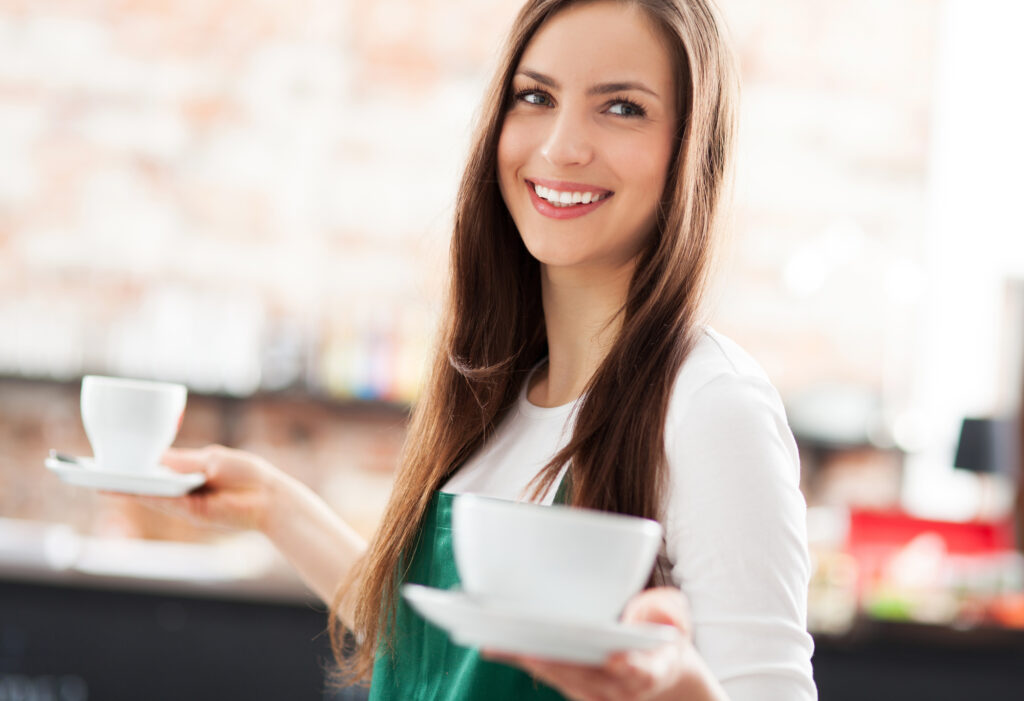 waitress serving coffee