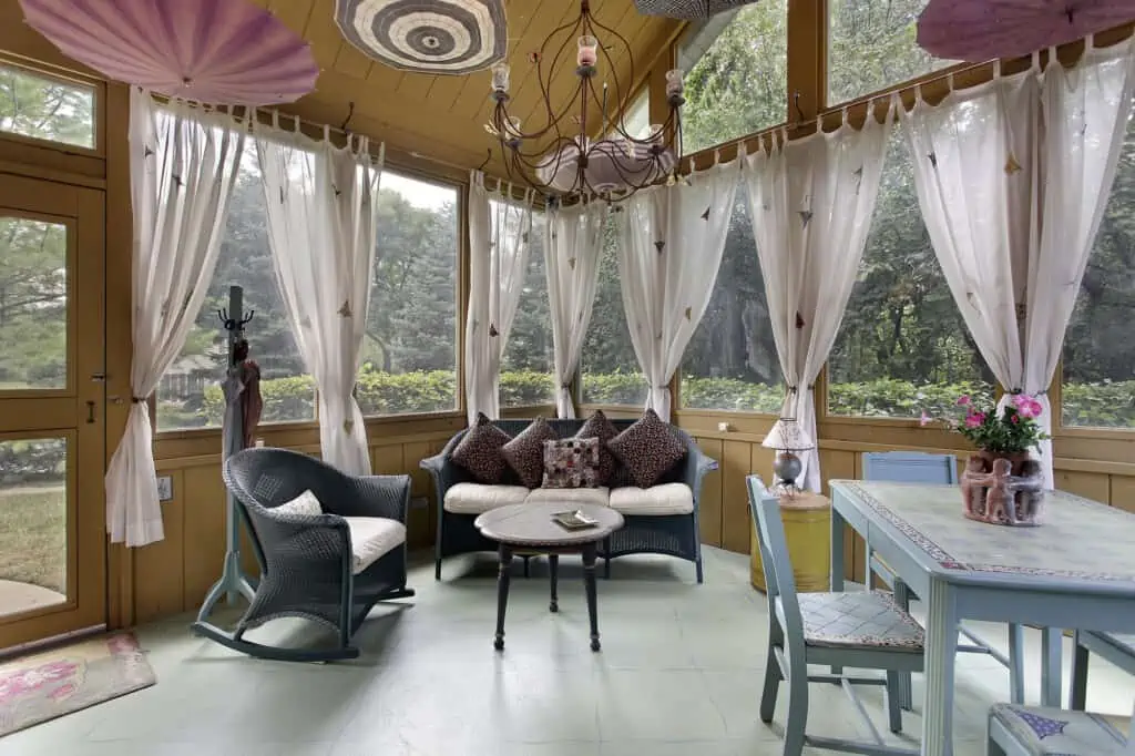 Porch in luxury home with white curtains