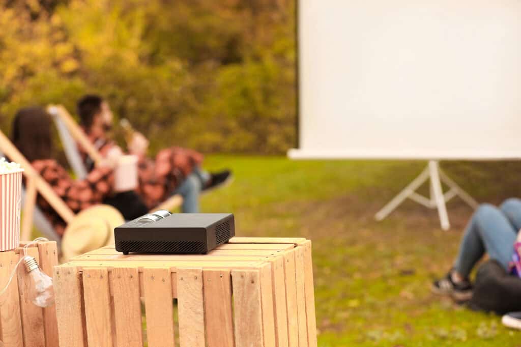 outdoor movie screen with projector